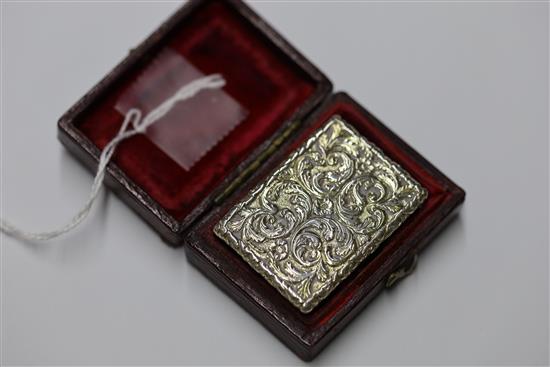 A George IV silver gilt rectangular vinaigrette by Nathaniel Mills, in original fitted leather box, 38mm.